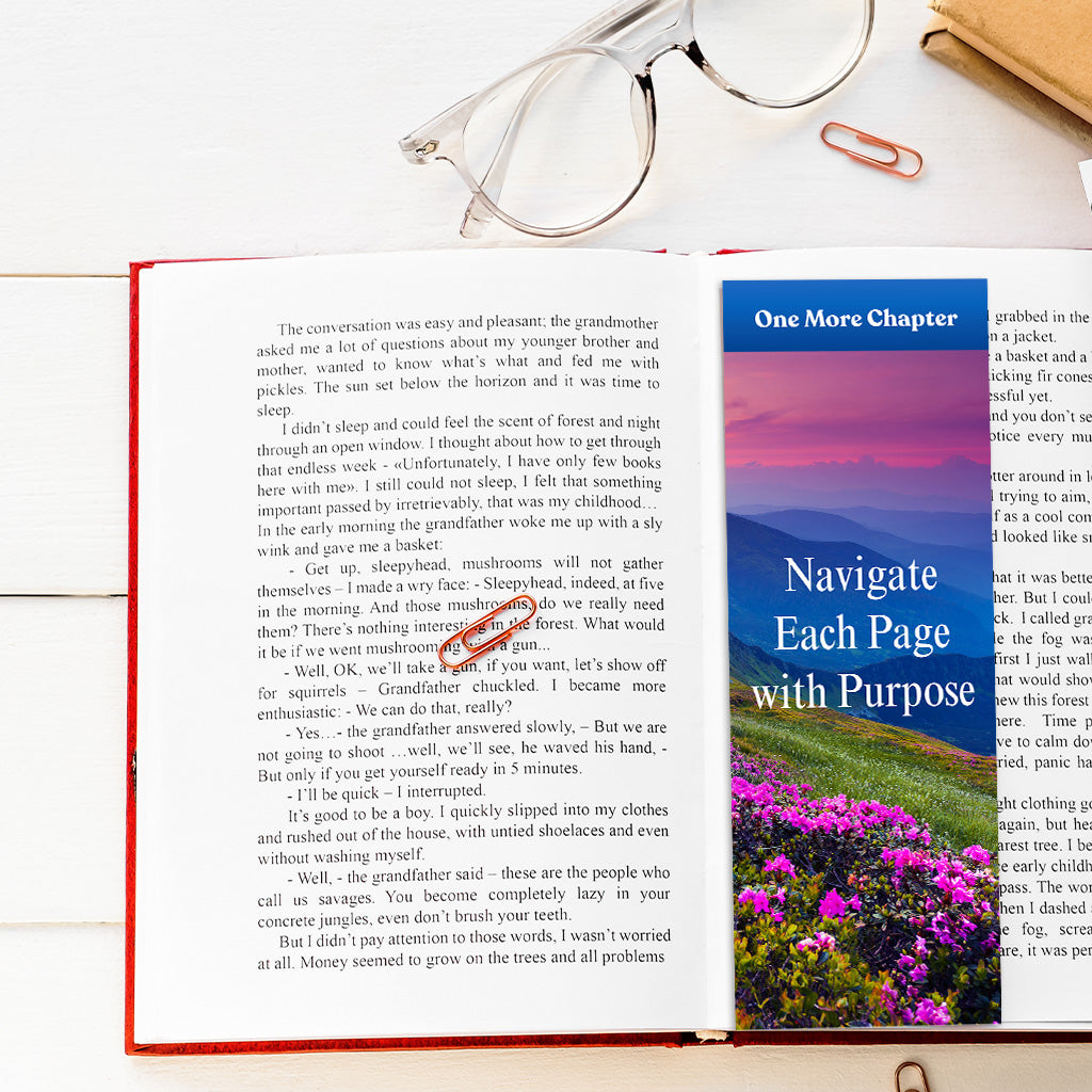 'One More Chapter' Bookmark on an open book with glasses and pen, a stylish and functional book accessory for avid readers.