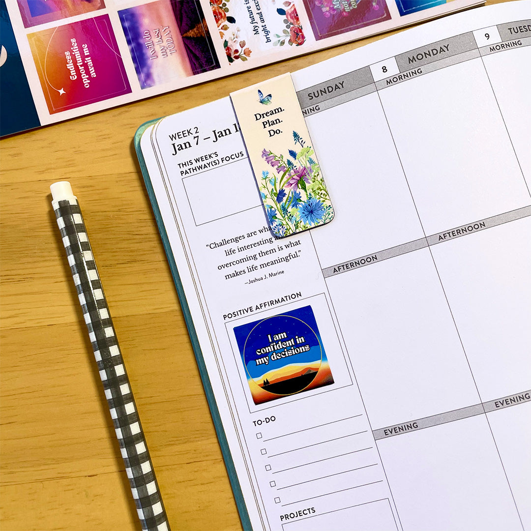 Daily planner with Positive Affirmation Stickers – Motivational & Uplifting, featuring a confidence-boosting quote and bookmark for goal setting and planning.