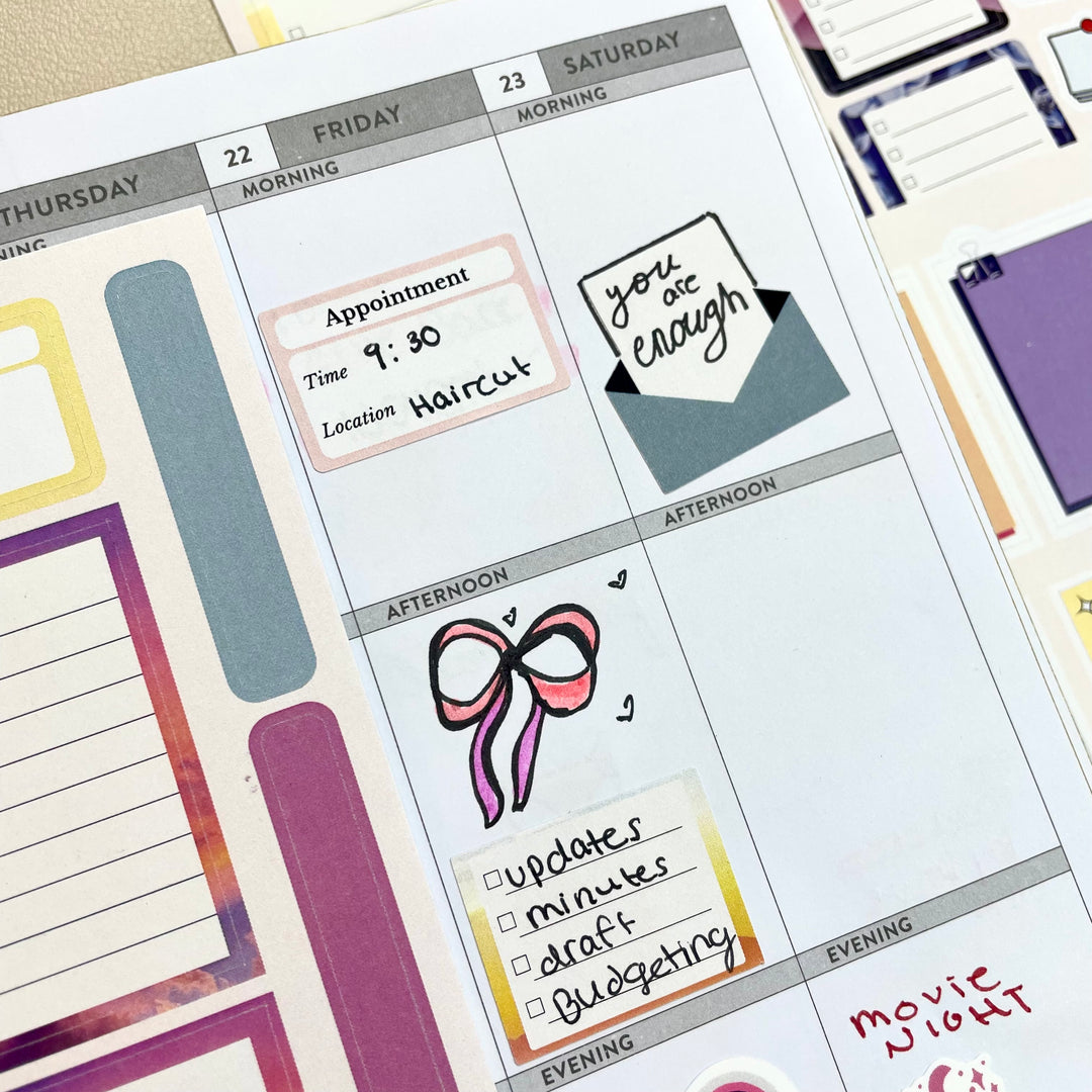 Planner decorated with Purposeful Planning Stickers for Journals & Planners showing appointment reminders, motivational quotes, and checklist icons.