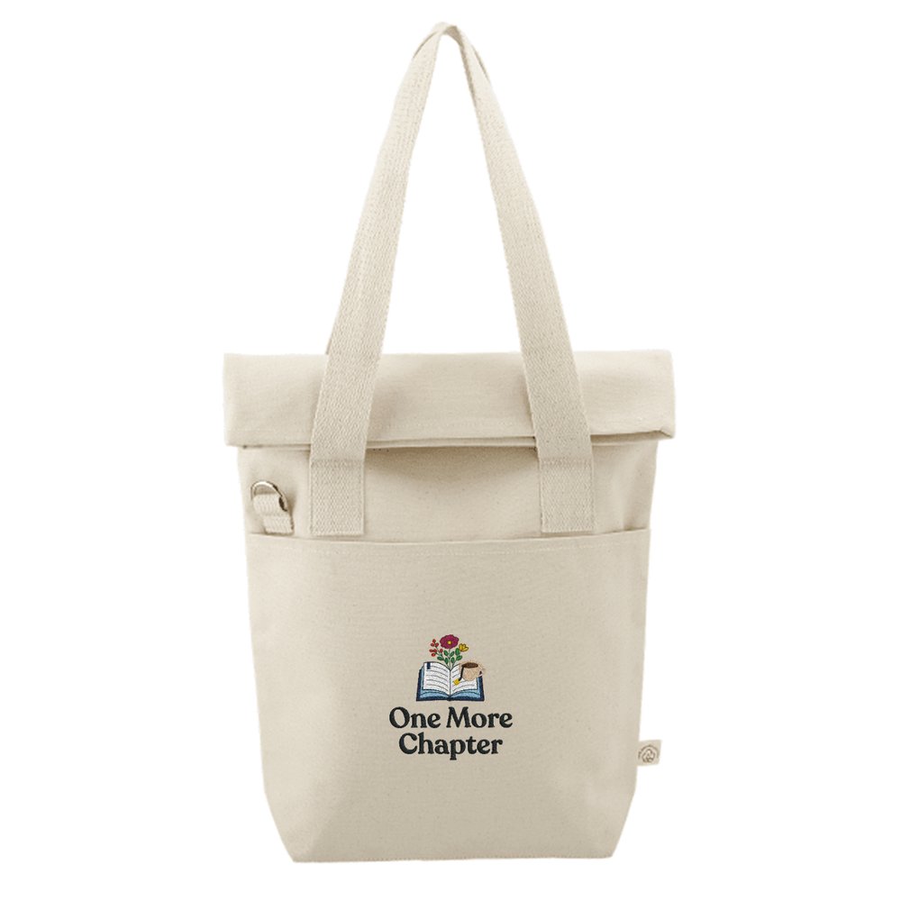 'One More Chapter' Organic Cotton Tote Bag with book and flower graphic on front pocket, ideal for book lovers and eco-conscious shoppers.