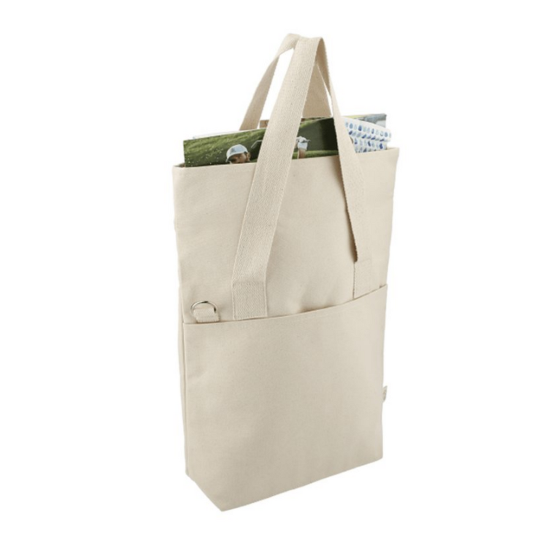 Side view of 'One More Chapter' Organic Cotton Tote Bag showing spacious interior with books and magazines inside front pocket.