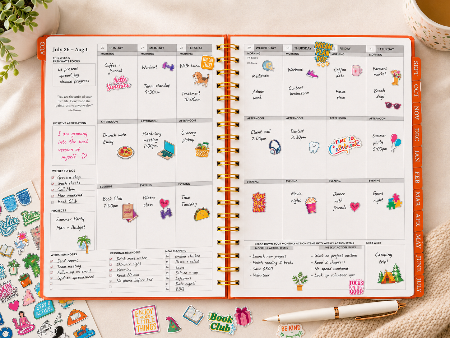 Open planner with daily tasks and stickers on a desk