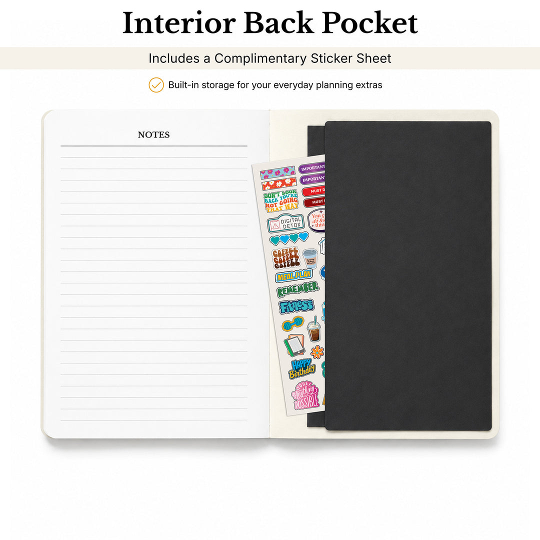 An open planner or notebook showing the interior back pocket feature, with a lined notes page on the left, a black pocket on the right, and a colorful sticker sheet tucked between them. Text at the top reads &