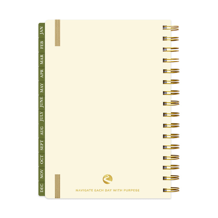 Beige planner with gold accents on a white background 