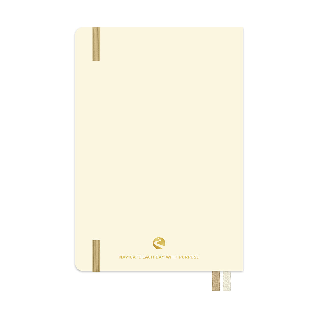 Beige notebook with gold accents on a white background 
