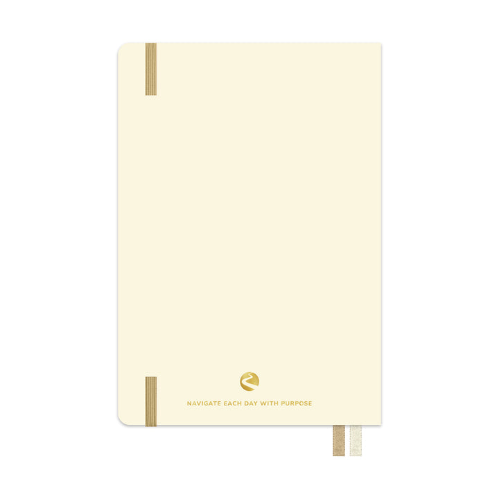 Beige notebook with gold accents on a white background 