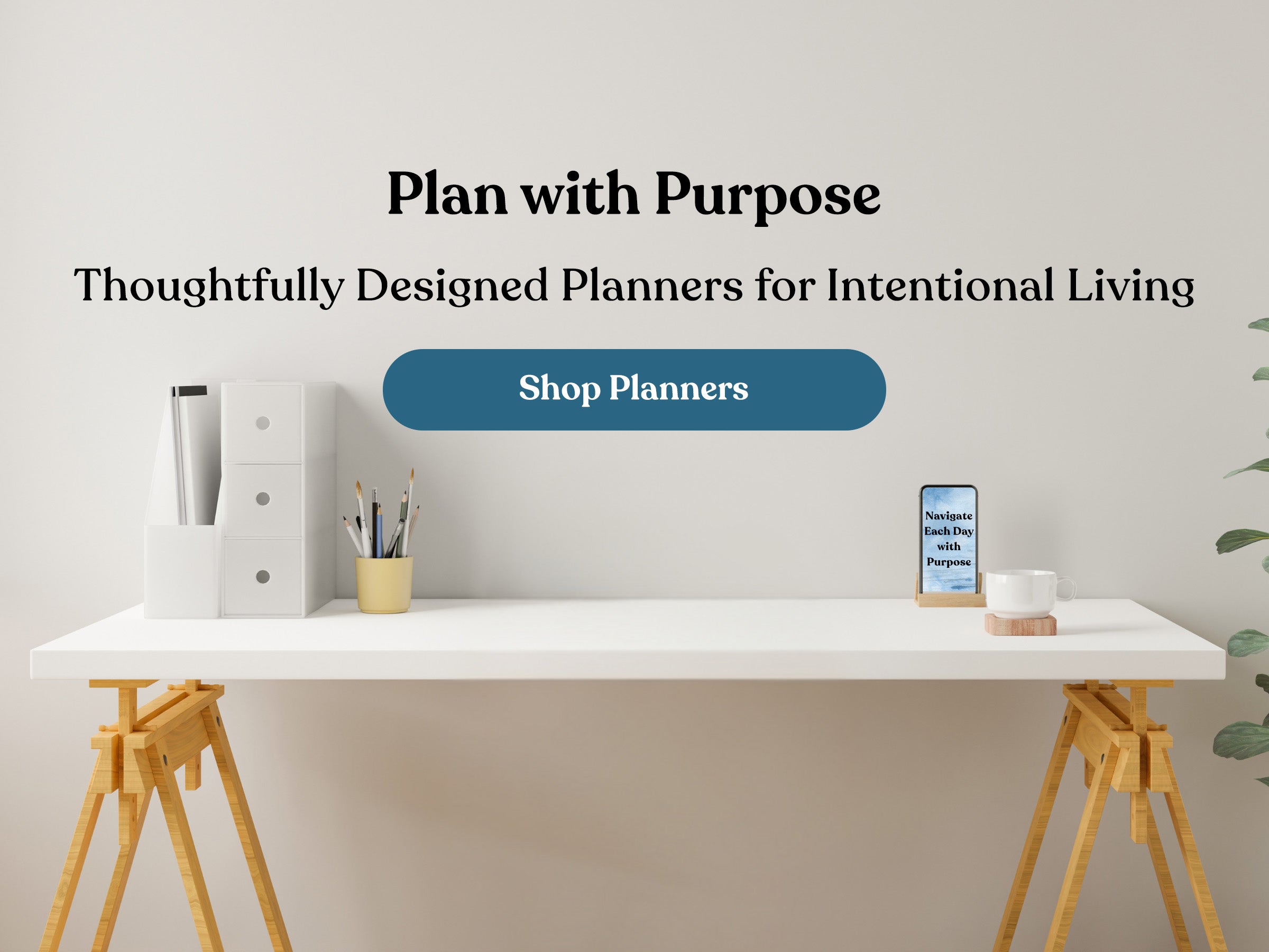 White desk with planners and a phone, featuring text about purposeful planning.