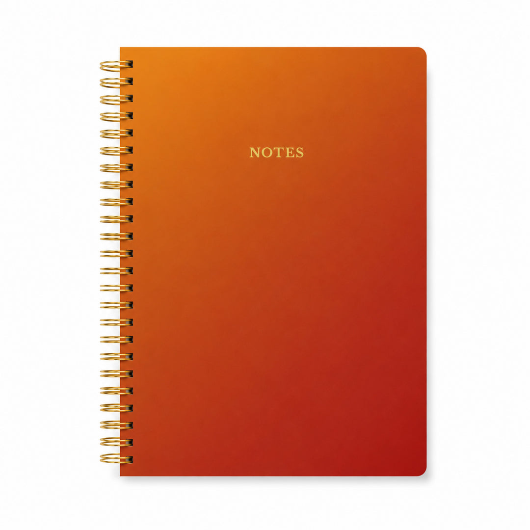 Orange spiral-bound notebook with &