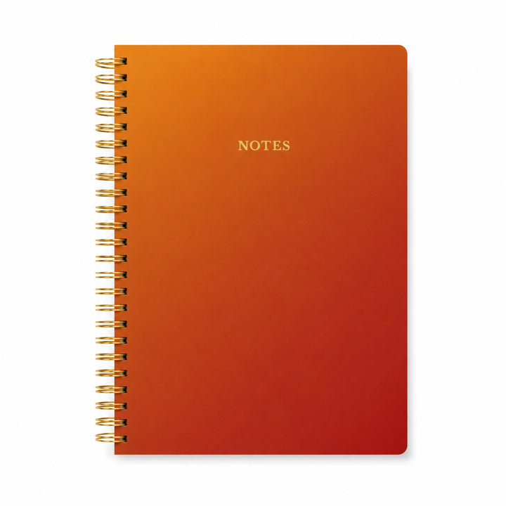 Orange spiral-bound notebook with &
