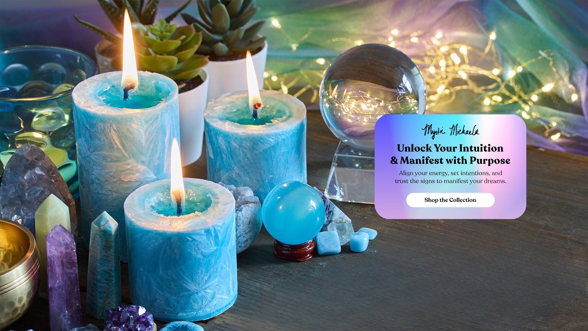 Blue candles with crystals and a crystal ball on a wooden surface, with a promotional card overlay.