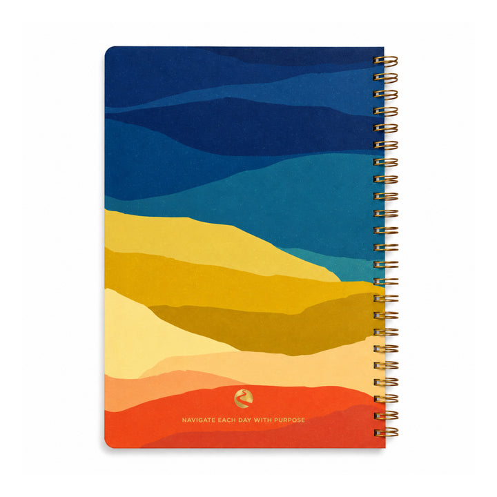 Notebook with colorful landscape design on a white background 