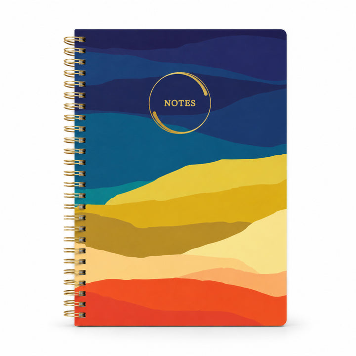 Notebook with colorful landscape design on a white background 