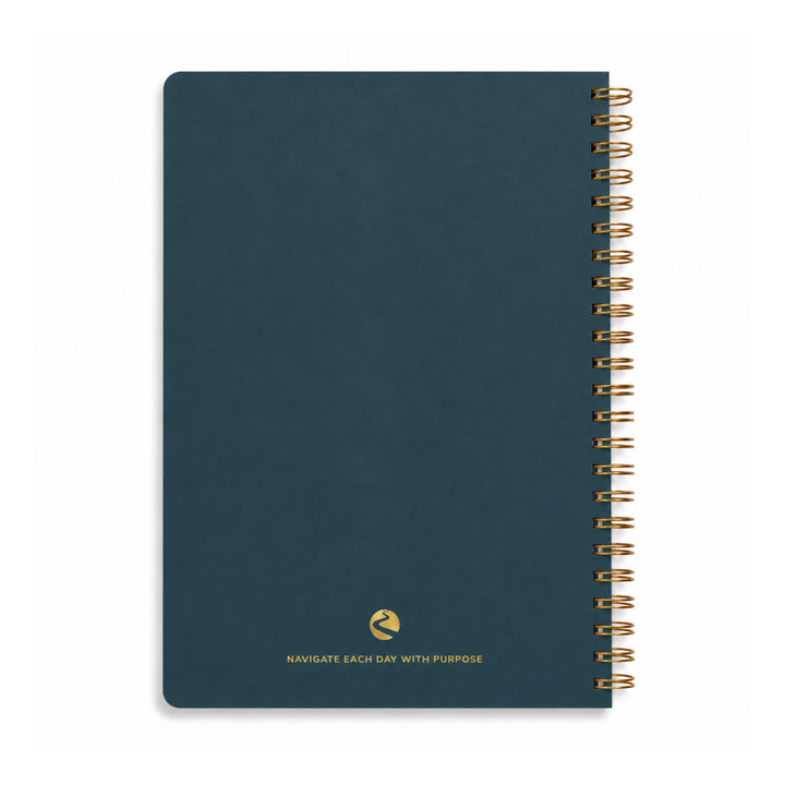 Blue notebook with gold spiral binding on a white background 