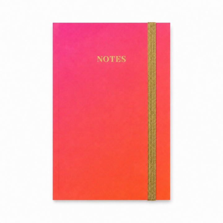 Gradient notebook with pink to orange colors and &