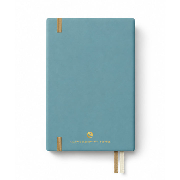 Blue planner with gold accents on a white background 