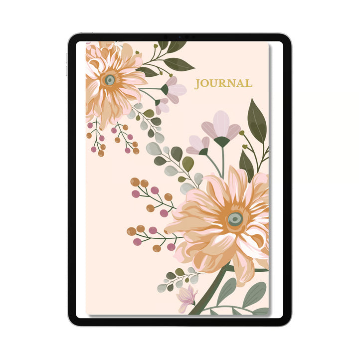 A black-framed journal with a cream cover decorated with peach flowers, green leaves, and delicate pink accents, featuring the word &