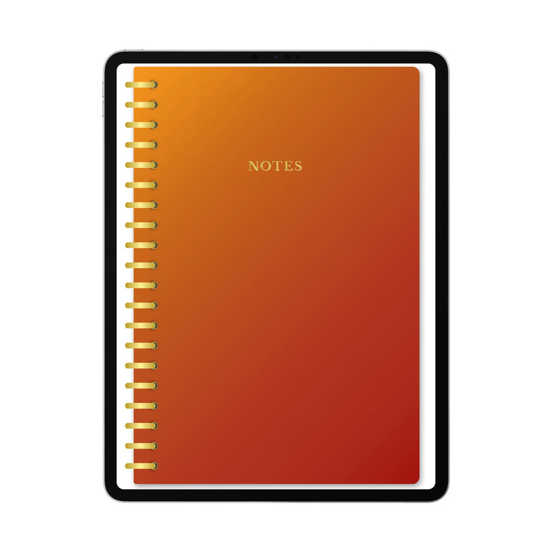 A spiral-bound notebook with a warm orange-to-red gradient cover, gold wire binding, and the word &
