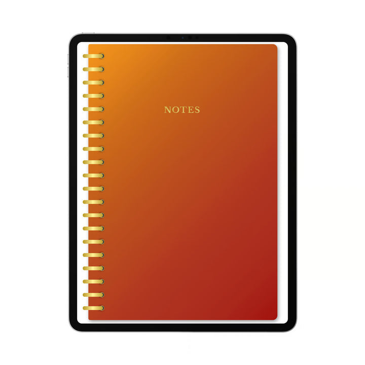 A spiral-bound notebook with a warm orange-to-red gradient cover, gold wire binding, and the word &