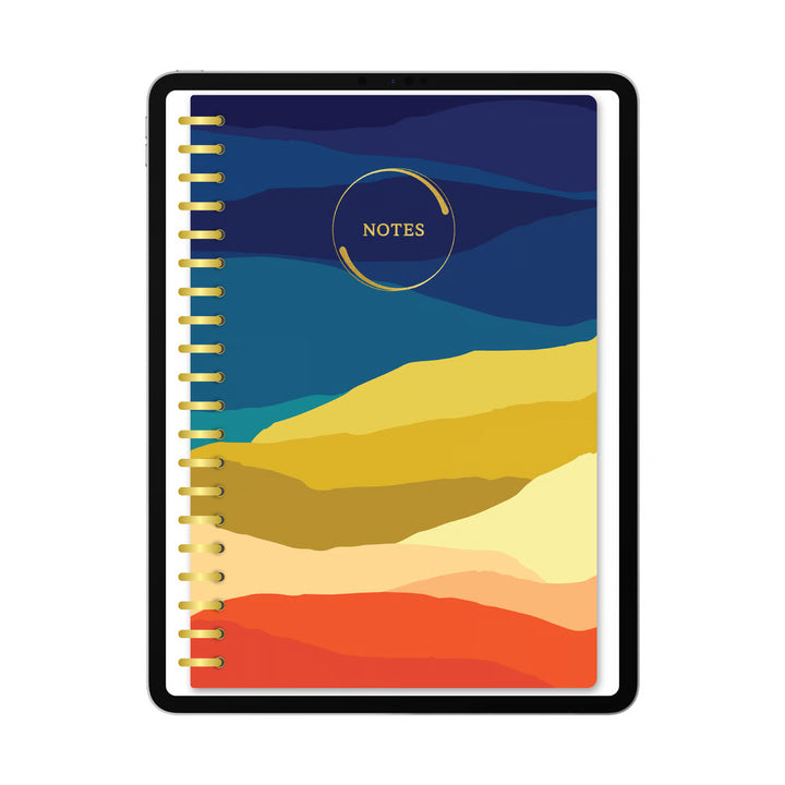 A spiral-bound notebook with a colorful abstract landscape cover design, shown on a white background. 