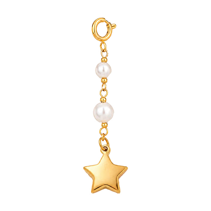 Gold charm with star and pearl on a white background 