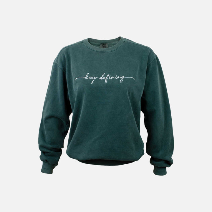 Front of the spruce green comfort colors crewneck sweatshirt with "keep defining" embroidered across the chest. #color_blue-spruce